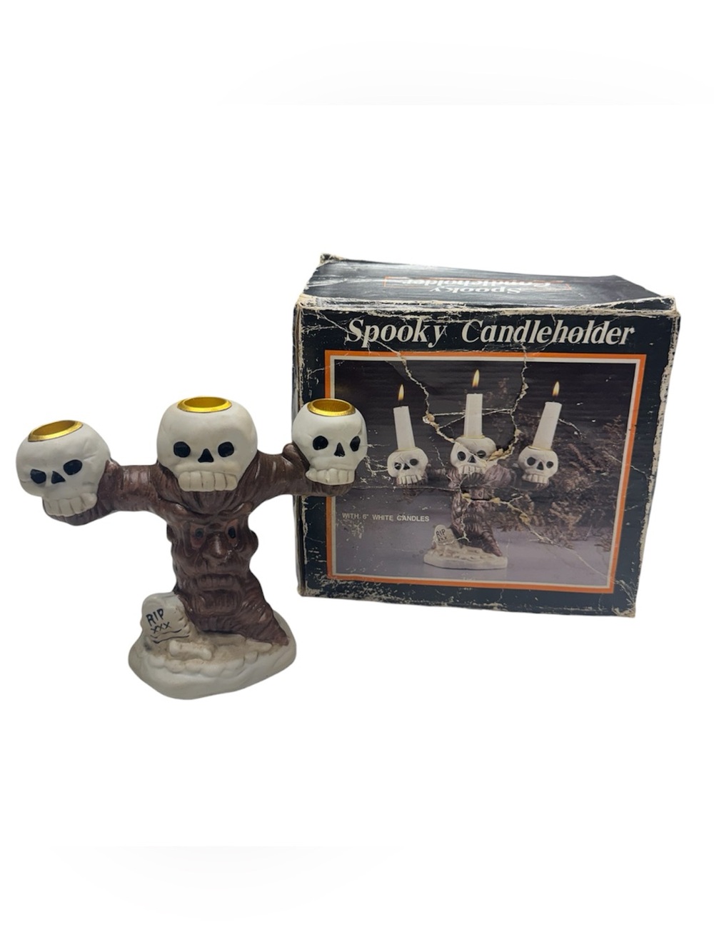 ABC Distributing Inc. brand spooky candleholder with 3 skulls, and original box.
